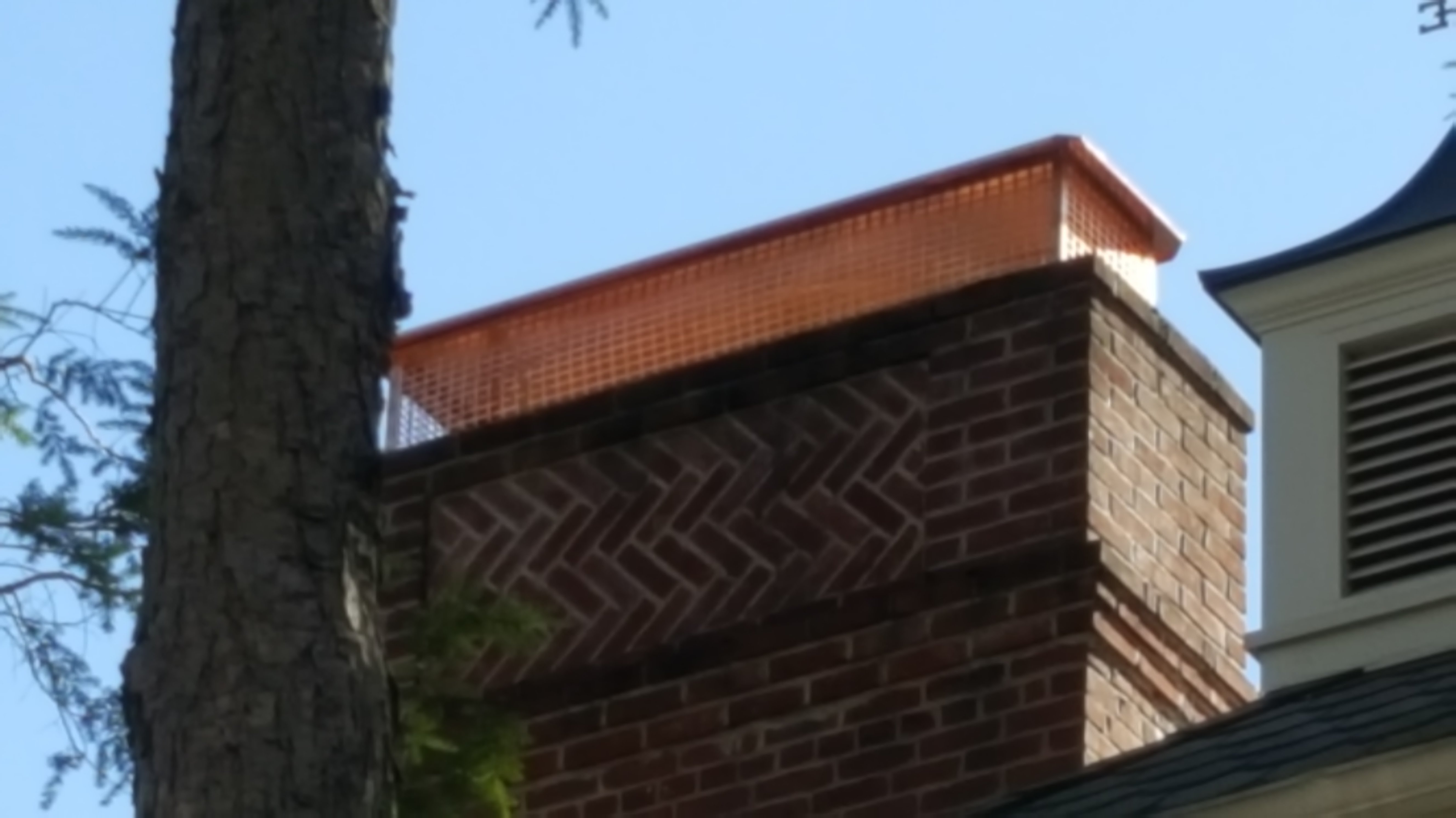 New stainless steel chimney cap installed in Roslyn, NY