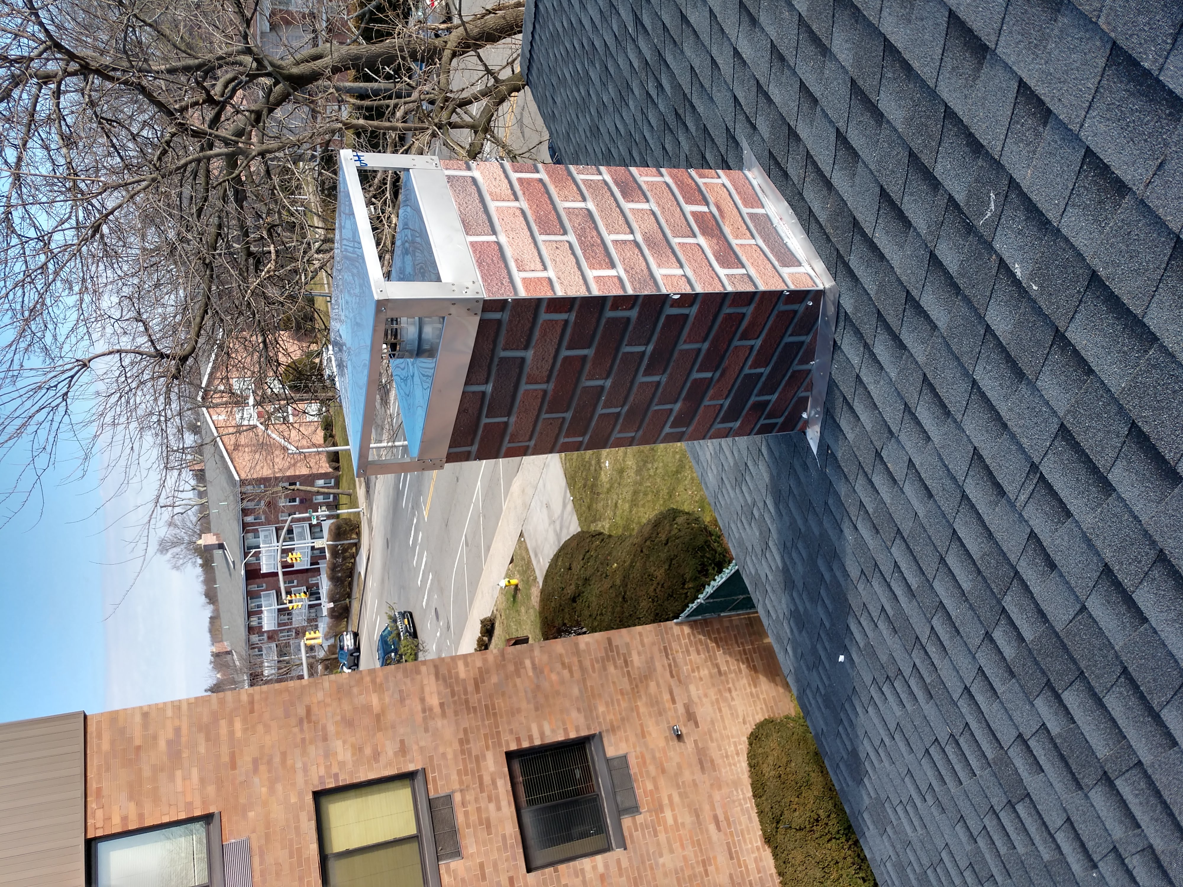New elastomeric sealant applied to chimney crown in Roslyn, NY