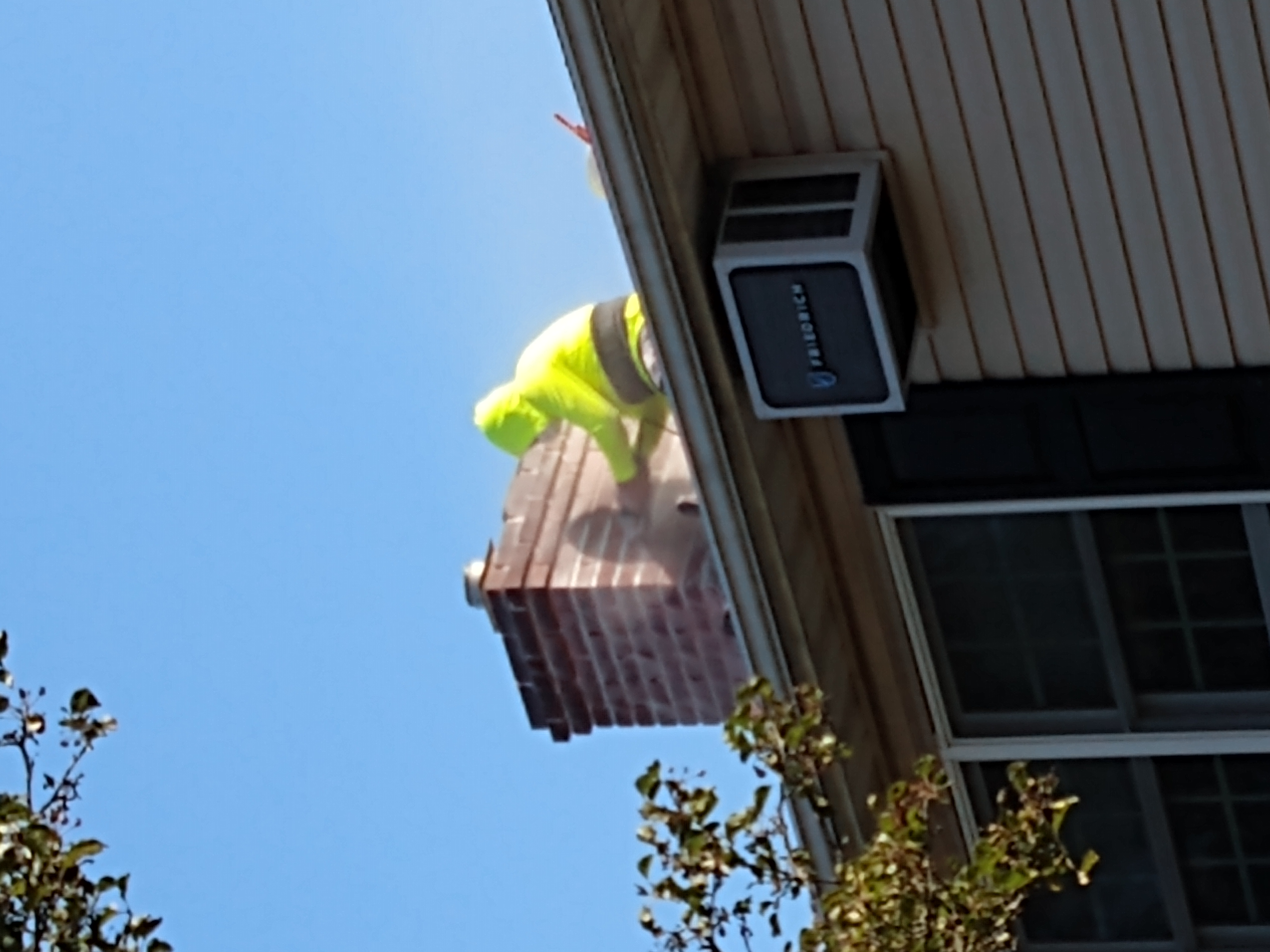 Chimney tuckpointing and mortar repair in Roslyn, New York
