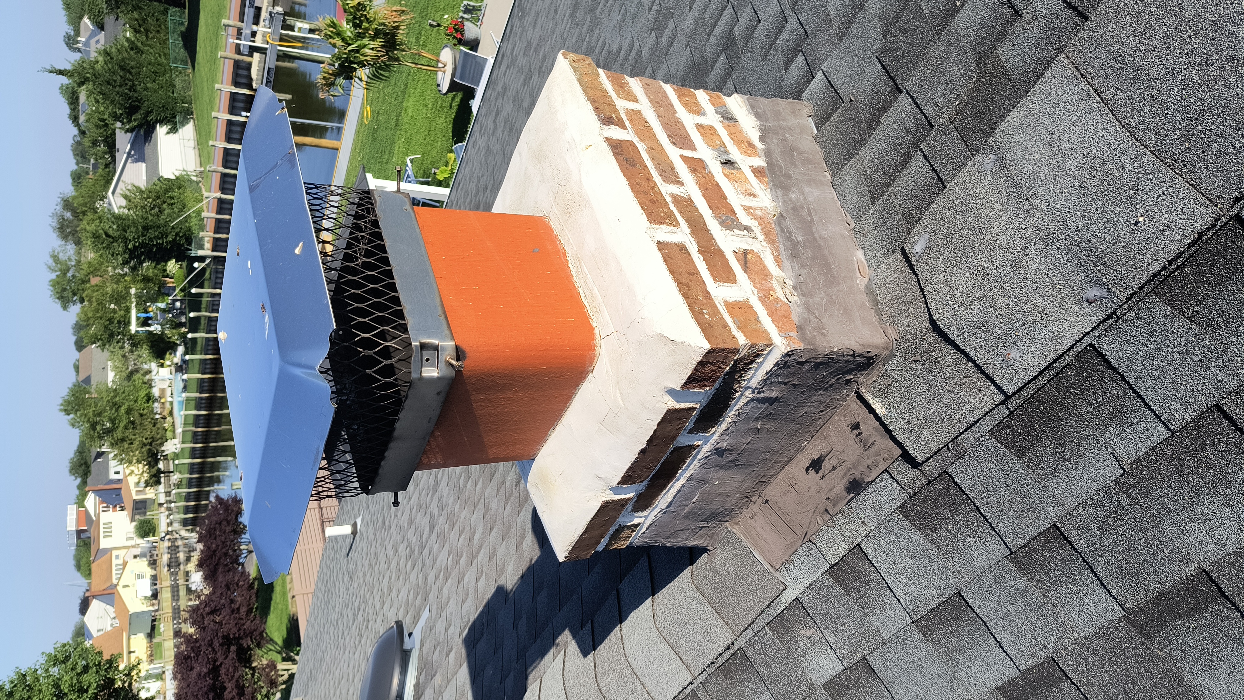 Full chimney masonry rebuild and restoration in Roslyn, NY